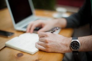 writing in personalised notebook