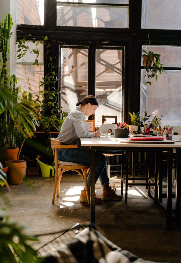 sitting-at-desk-writing